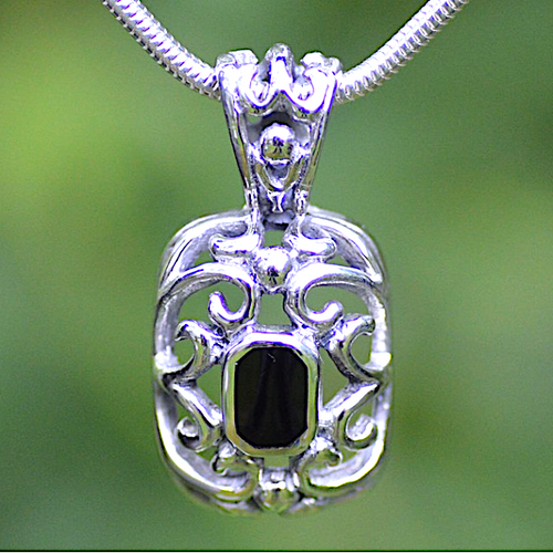 Ornate sterling silver filigree pendant with Whitby Jet on thick silver snake chain