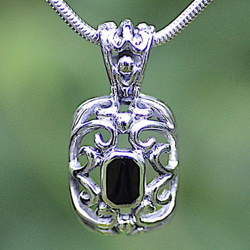 Ornate sterling silver filigree pendant with Whitby Jet on thick silver snake chain