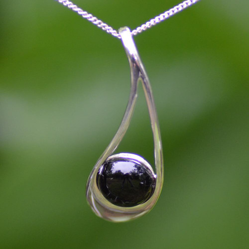 Curved sterling silver and Whitby Jet modern cabochon pendant