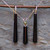 Matching gift set of long cylindrical Whitby Jet drop pendant and earrings on 9ct gold