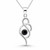 Contemporary sterling silver pendant with round Whitby Jet stone on curb chain