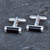 Contemporary sterling silver and Whitby Jet barrel cufflinks with T bar fastening