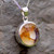 Hand crafted deep circular blue john and sterling silver necklace