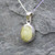 Dainty oval yellow connemara marble pendant on sterling silver chain