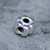 Hand crafted sterling silver Whitby Jet floral charm bead for bracelet