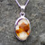 Unique Derbyshire blue john and sterling silver oval stone pendant with solid silver reverse