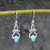 Fancy handmade Kingman turquoise and 925 sterling silver scroll drop earrings