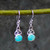 Oval stone dangly Kingman turquoise and 925 silver Trinity Knot earrings