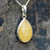 Hand crafted yellow amber and 925 silver pear drop necklace