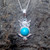 Blue turquoise and sterling silver owl pendant with sparkly cubic zirconia eyes