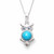 Blue turquoise and sterling silver owl pendant with sparkly cubic zirconia eyes