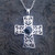 Contemporary Sterling silver Celtic cross pendant with round Whitby Jet stone