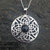 Sterling silver large round Celtic Pendant with Whitby jet cabochon