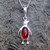 Contemporary Baltic cognac amber sterling silver penguin pendant necklace