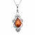 Large fancy sterling silver filigree pendant with Baltic cognac amber teardrop stone