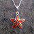 Contemporary sterling silver star pendant with five cognac amber marquise stones