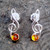 Sterling silver treble clef stud earrings with Baltic amber cabochons
