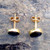 Large oval Whitby Jet and 9ct gold ear studs with butterfly scrolls