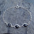 Handcrafted Sterling silver bracelet set with three Whitby Jet oval cabochons