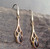 Handmade  9K yellow gold dangly earrings with organic black teardrop gemstone