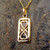 Oblong gold and Jet necklace with two hearts detailing on reverse