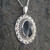 Large oval sterling silver and Whitby Jet filigree pendant