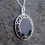 Large oval fancy scroll edge sterling silver Whitby Jet pendant