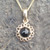 Small 9ct gold and Whitby Jet daisy necklace on gold curb chain