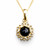 Small 9ct gold and Whitby Jet daisy necklace on gold curb chain