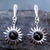 Contemporary sterling silver sun drop earrings with round Whitby Jet cabochons