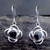 Hand crafted 925 silver floral drop earrings with round black Whitby Jet stones