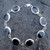 Hand crafted Whitby Jet and sterling silver oval multi stone rope edge bracelet