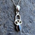 Small curved sterling silver Whitby Jet Celtic loop necklace with presentation box