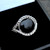925 silver ring with organic black gemstone cabochon and silver beading