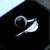 Modern hand crafted open 925 silver ring with round Whitby Jet and feather detailing