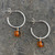 Sterling silver hoop earrings with Baltic cognac amber beads and scroll fastenings