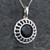 Sterling Silver wheel necklace with circular Whitby Jet cabochon on 925 silver curb chain