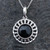 Whitby Jet sterling silver wheel pendant necklace with round cabochon