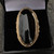 Handmade elongated fancy rope edge oval Whitby Jet 9ct gold ring