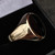 Handmade smooth shiny oval signet ring with organic black gemstone