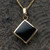 9ct gold necklace with hand carved square shiny black organic gemstone