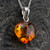 Cognac amber puff heart pendant on sterling silver curb chain