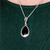 Classic 925 silver rope edge teardrop pendant with hand cut shiny organic black gemstone