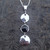 Long Whitby Jet hammered sterling silver three disc circular pendant