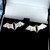 Large silver and black bat ear studs with gift case
