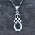 Classic sterling silver Celtic Whitby Jet pendant with oval stone on silver curb chain