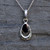 925 silver horse shoe necklace with hand carved oval organic black gemstone