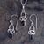 Set of matching sterling silver Celtic loop necklace and drop earrings with oval Whitby Jet