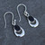 Hand crafted sterling silver horseshoe drop earrings with oval Whitby Jet stones