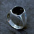 Hand crafted silver signet ring with curved shoulder and organic black gemstone  Hand crafted silver signet ring with curved shoulder and organic black gemstone